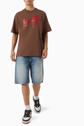 تي شيرت بشعار Bape Sta ونقشة مموهة وزهور قطن