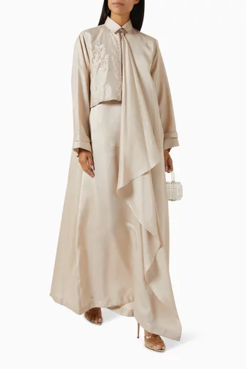 فستان طويل بنمط قميص مزين بدرابيه وتطريزات