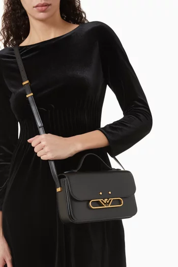 حقيبة كتف بشعار الماركة على شكل نسر جلد