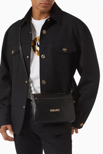 Logo-tag Crossbody Bag in Leather