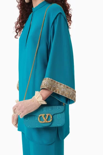 Locò Embellished Clutch Bag in Moiré