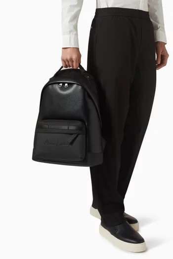 Logo-embossed Backpack in Faux Leather