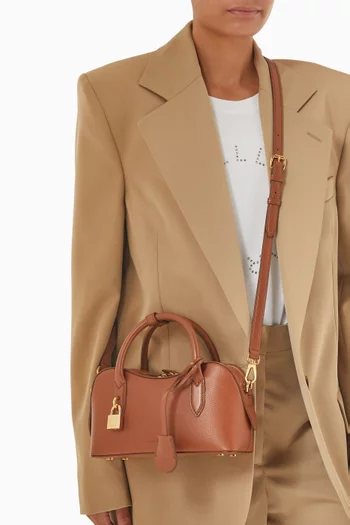 حقيبة كتف رايدر صغيرة جلد صناعي صديق للبيئة بملمس بارز