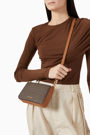 Small Bryant Convertible Pochette Bag in Signature Coated Canvas