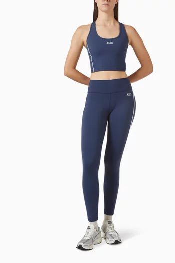 بلوزة رانر رياضية بلا أكمام بشعار الماركة