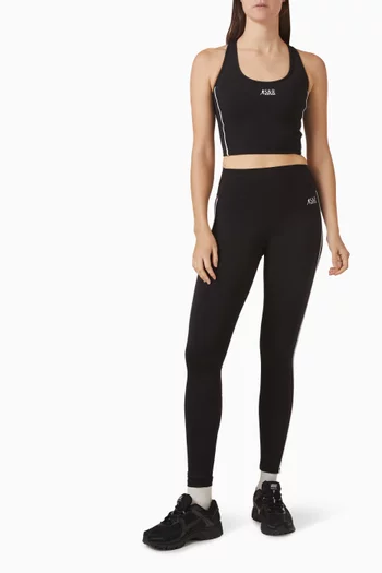 بلوزة رانر رياضية بلا أكمام بشعار الماركة