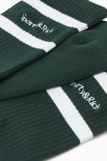 جوارب بشعار الماركة بخط سيريف قطن