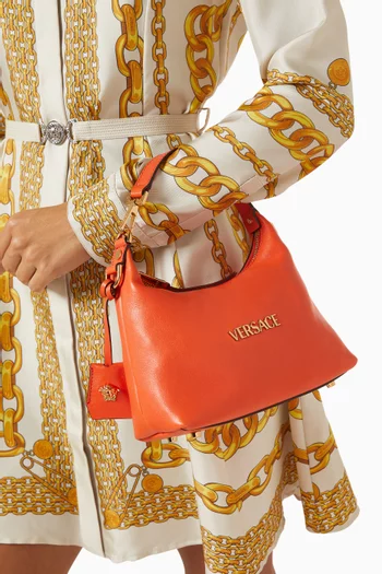 Medusa Tag Hobo Bag in Leather