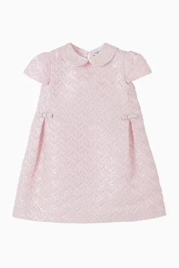 فستان بعقدة وشعار النسر 