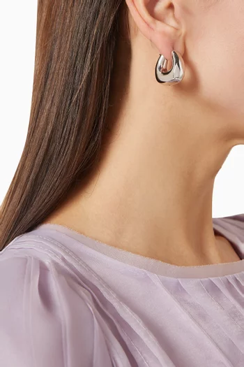 أقراط صغيرة منحوتة بتصميم سميك مقوس نحاس مطلي روديوم