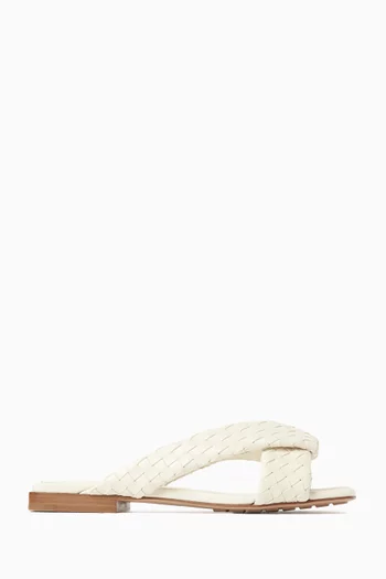 Riva Flat Mule Sandals in Woven Lambskin