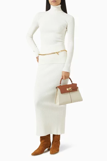 بلوزة بياقة عالية نسيج مضلع