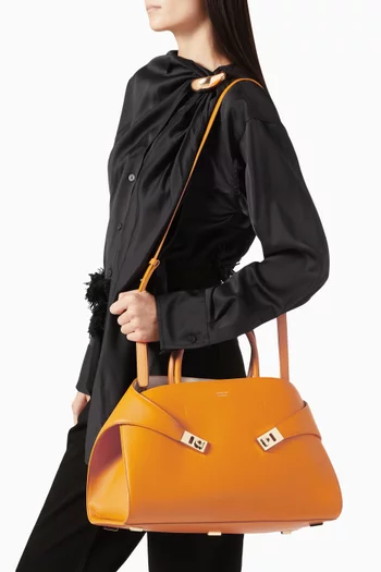Medium Hug Top Handle Bag in leather