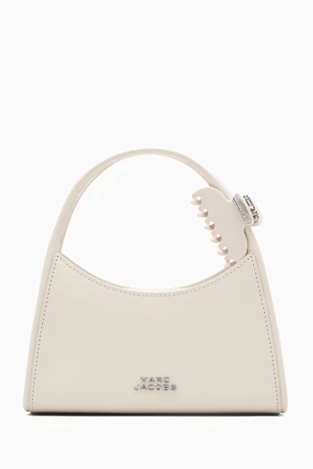 The Glam Claw Clip Crossbody Bag in Leather