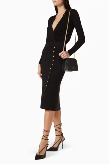 تنورة متوسطة الطول منسوجة بأزرار