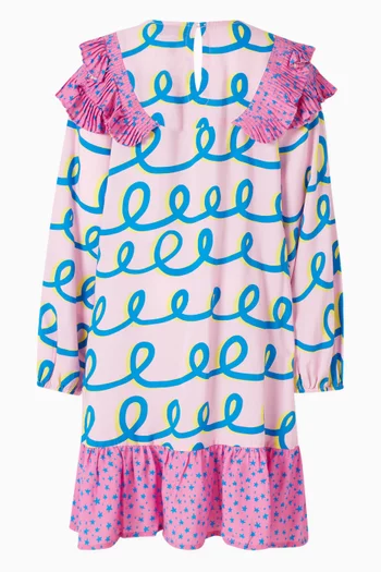 فستان بطبعة نجوم وخطوط مموجة 