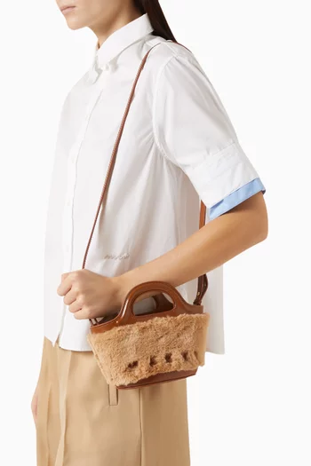 حقيبة تروبيكاليا مايكرو فرو صناعي وجلد