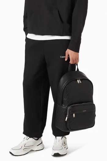 Embossed  Monogram Backpack