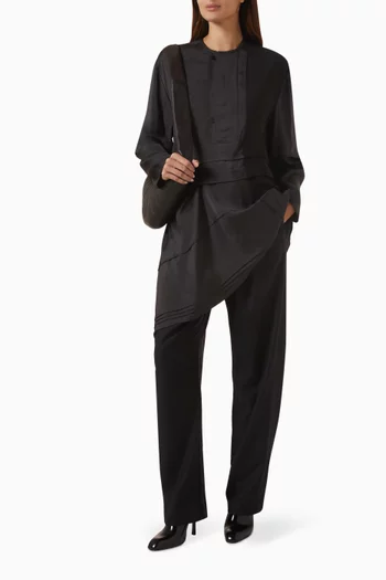 بلوزة بقصة فضفاضة بطيّات حرير