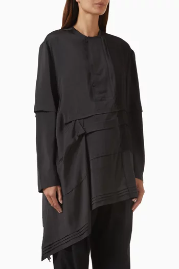 بلوزة بقصة فضفاضة بطيّات حرير