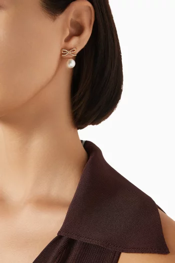 Crystal Bow Pearl Jacket Earrings in Gold-plated Brass