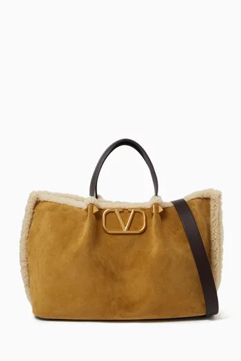 حقيبة يد متوسطة بشعار الماركة شمواه