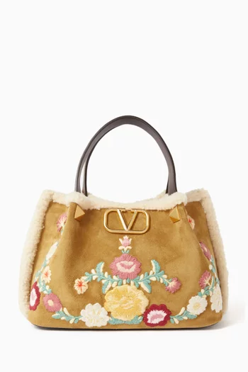 حقيبة يد صغيرة بشعار الماركة شمواه مطرز