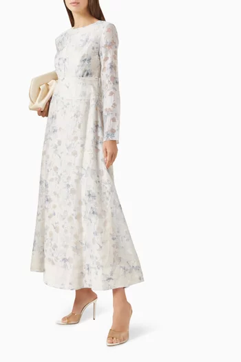 فستان متوسط الطول بنقشة زهور وتصميم مشد