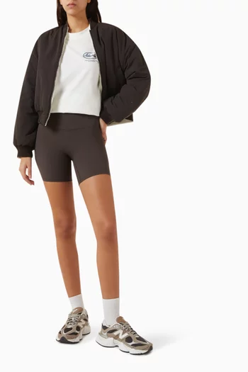 تي شيرت بقصة فضفاضة وطبعة شعار الماركة قطن