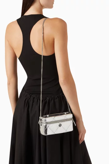 حقيبة مستحضرات تجميل إيست ويست كيرا بتصميم مبطّن بنقشة معينات