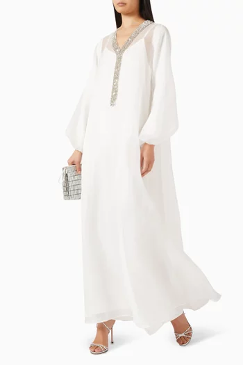 "Sheer kaftan featuring hand-embroidered crystal detailing cascading from the neckline to the waist, layered over a matching inner dress.":White    :S|218780199