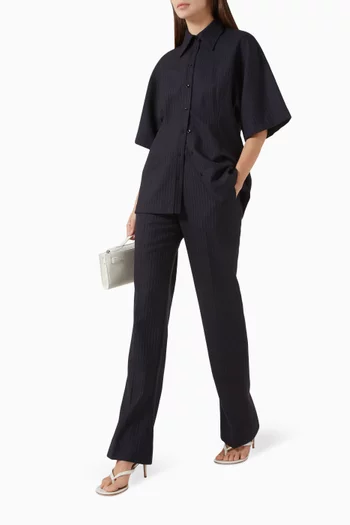 بنطال كورا بقصة ضيقة ونقشة مخططة صوف