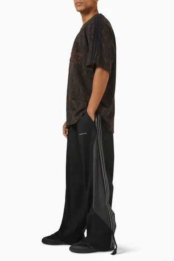 بنطال رياضي بحياكة مزدوجة أديداس × سونج فور ذا ميوت