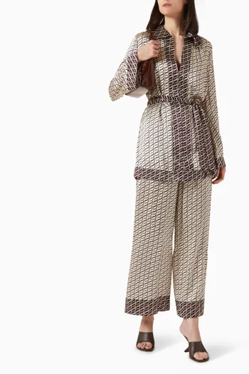 بنطال بنقشة شعار الماركة بلون مغاير حرير