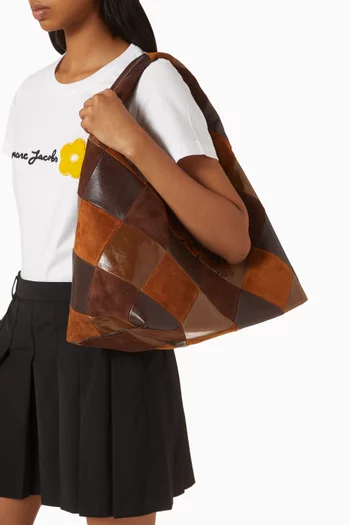 حقيبة كتف ساك بتصميم رقعات جلد وشمواه