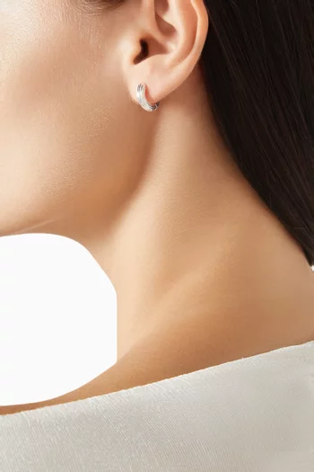 أقراط دائرية نون كونفورميست ميني فضة إسترلينية