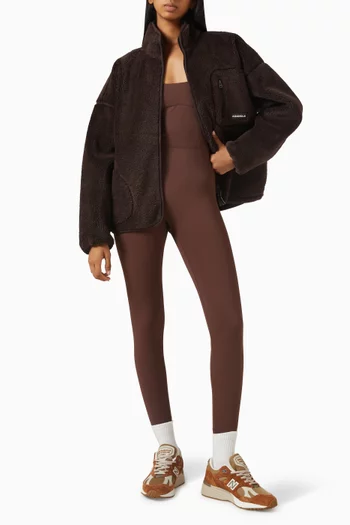 جاكيت بقصة فضفاضة وسحّاب صوف