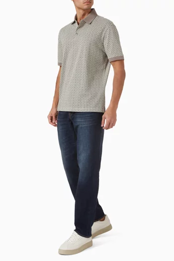 تي شيرت بولو مزين بالكامل بنقشة شعار AX قطن