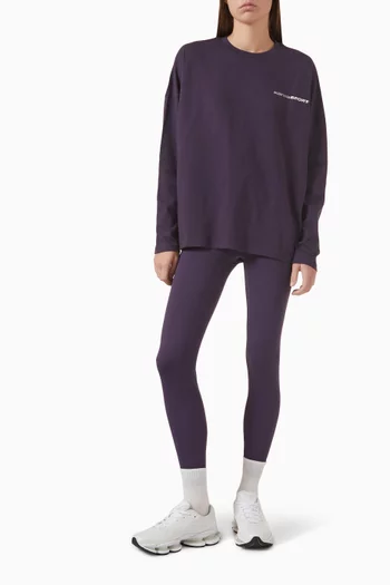 تي شيرت ناينتينز بتصميم جامعي وطبعة شعار الماركة وشعار Sport‏ قطن عضوي