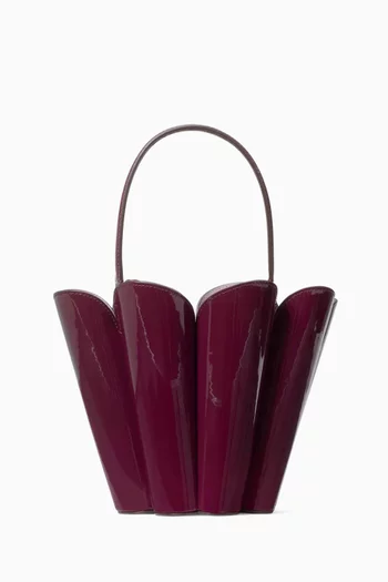 حقيبة باكيت بتصميم زهرة بشكل بستوني جلد لامع