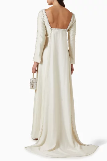 فستان مزين بتطريزات ستان