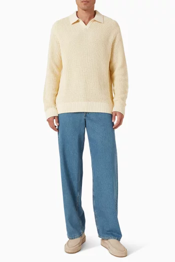 بنطال جينز بقصة ساق واسعة ولون باهت دينم