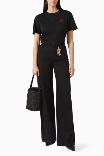 تي شيرت برقعة شعار الماركة بختم شمعي قطن