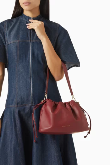 حقيبة شارلوت متوسطة برباط تضييق جلد نابا