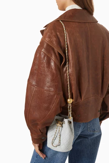 Quilted Pearl Crush Drawstring Bucket Bag in Leather