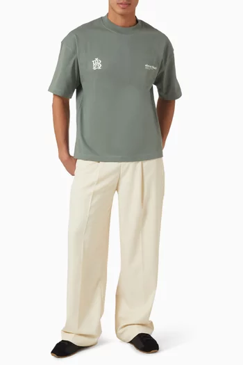 تي شيرت بطبعة شعارات الماركة قطن