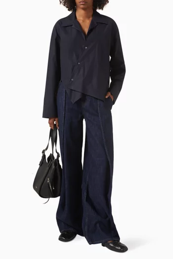 قميص بتصميم غير متماثل