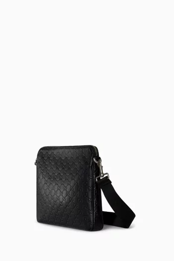 حقيبة كروس متوسطة بشعار حرفي GG جلد