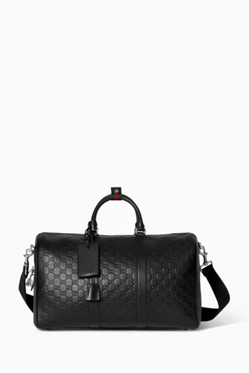 Medium GG Emblem Duffle Bag in Leather