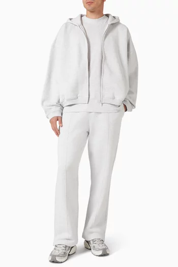 تي شيرت بقصة فضفاضة وشعار حرف الماركة قطن